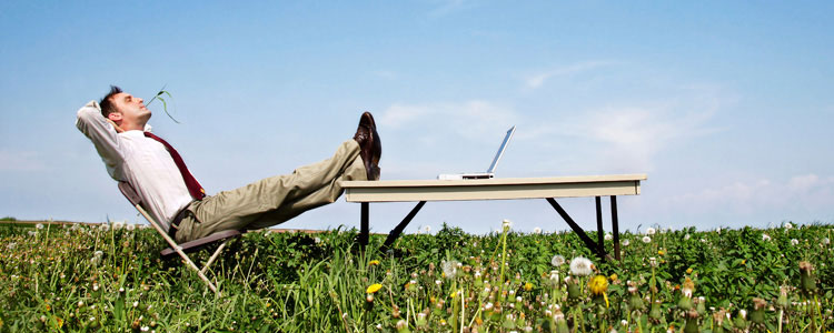 Picture of a man with his feet up.